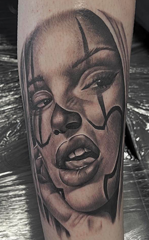 Tattoo of a women/clown